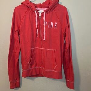 Worn Women’s jacket with some fuzzies. Still in good condition.